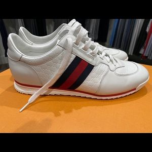 Almost new Gucci sneakers-worn 1 time.